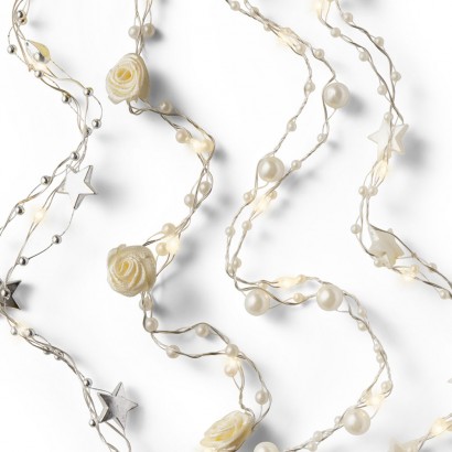 Garnalda microled a piles 4 models assortits (perles, roses, estrelles blanques i estrelles platejades)